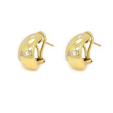 Gold hoop earrings with small diamonds on a white background