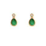 Pair of 14K yellow gold earrings with emerald green gemstones and diamonds on a white background