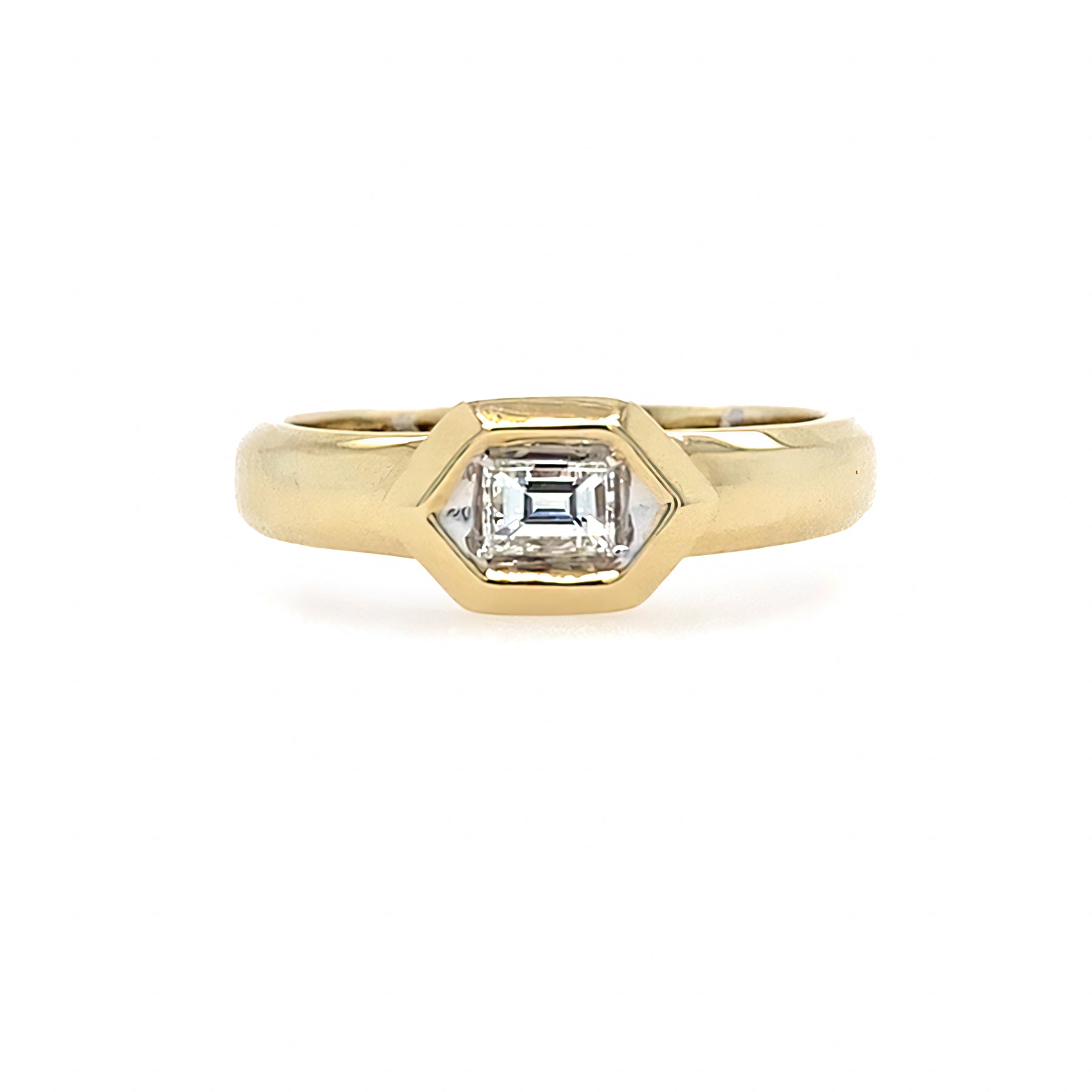 14K Gold ring with a hexagon bezel diamond on a white background