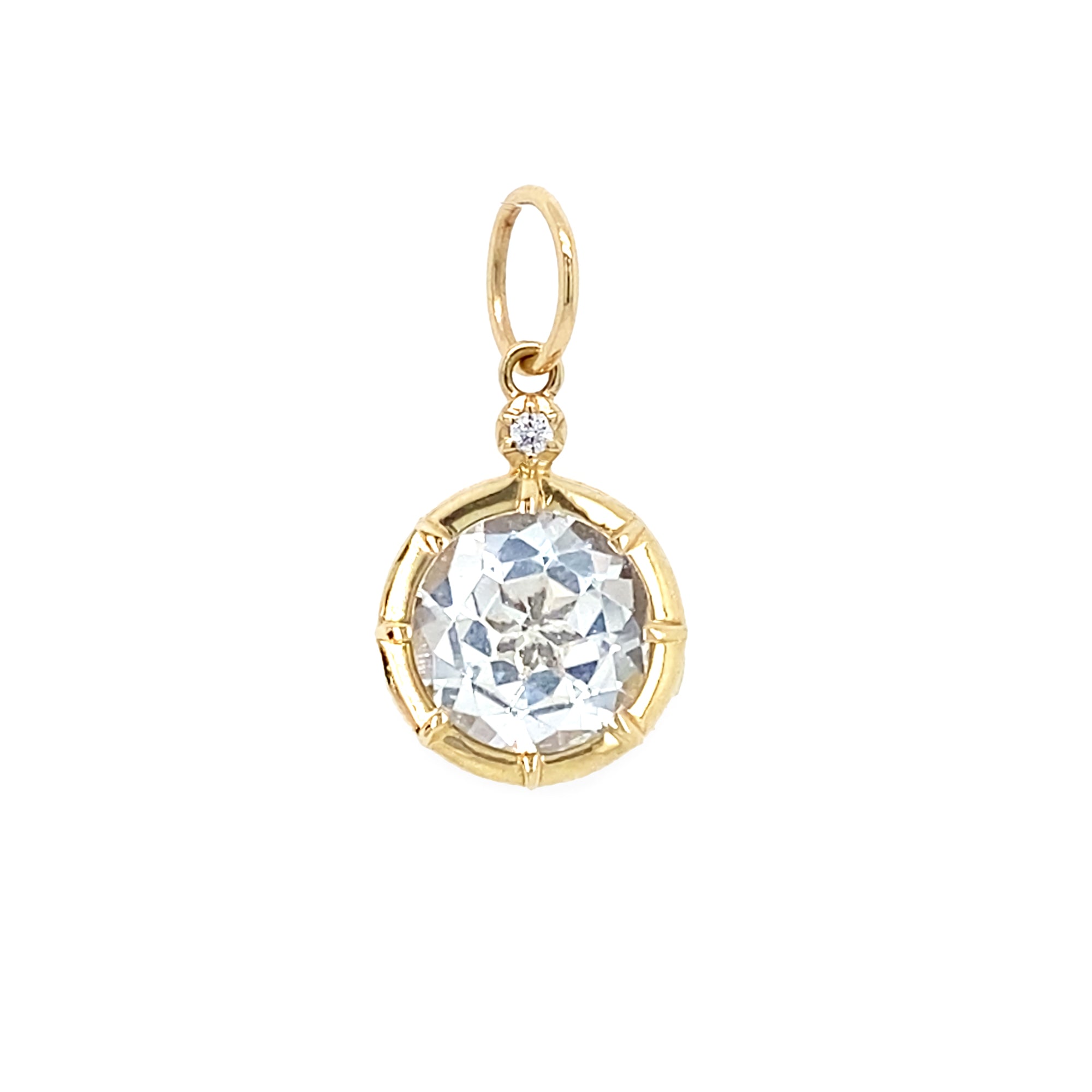 14K Gold pendant with a clear white topaz genstome on a white background