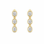 A pair of 14K gold drop earrings featuring three round-cut clear diamonds in each earring, set against a plain white background.