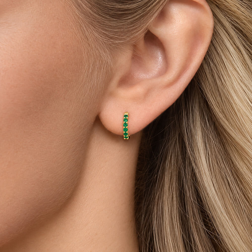 14K yellow gold emerald huggie earrings