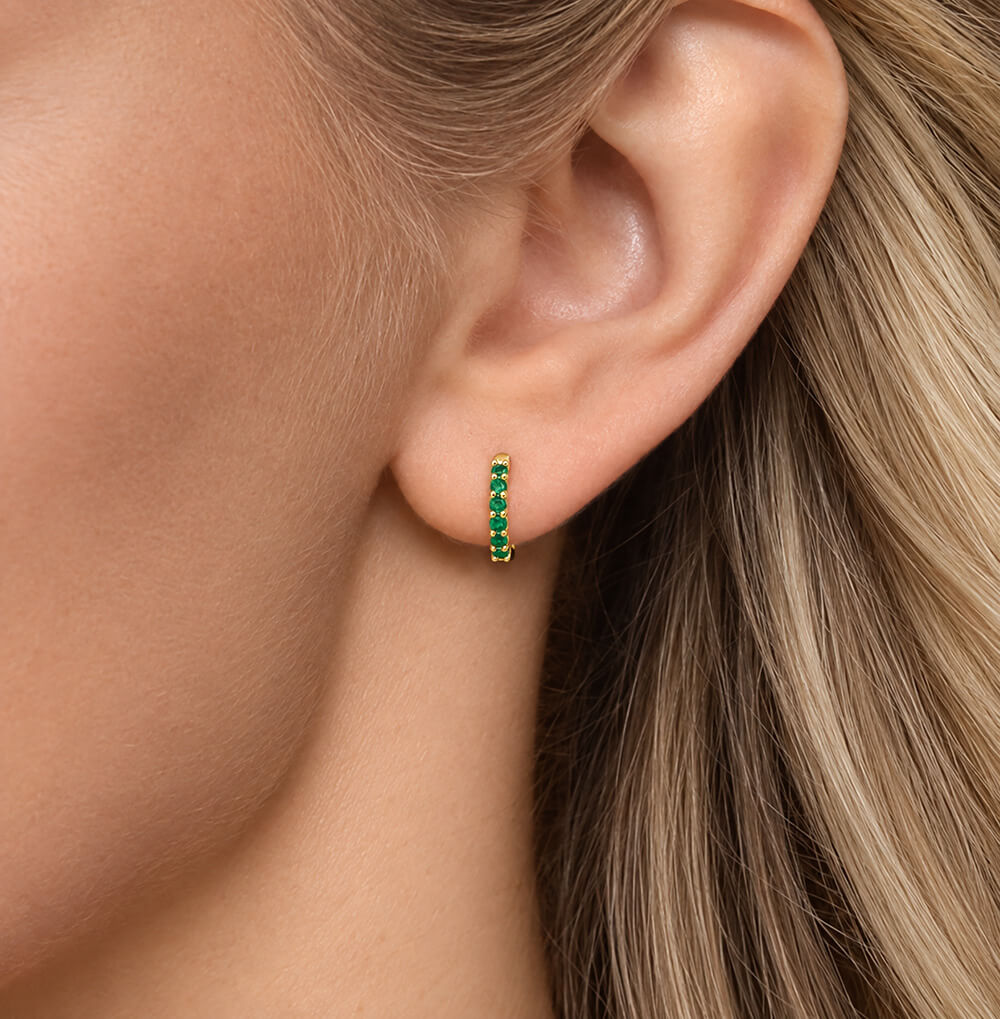 14K yellow gold emerald huggie earrings