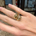 14k yellow gold scattered diamond ring on hand