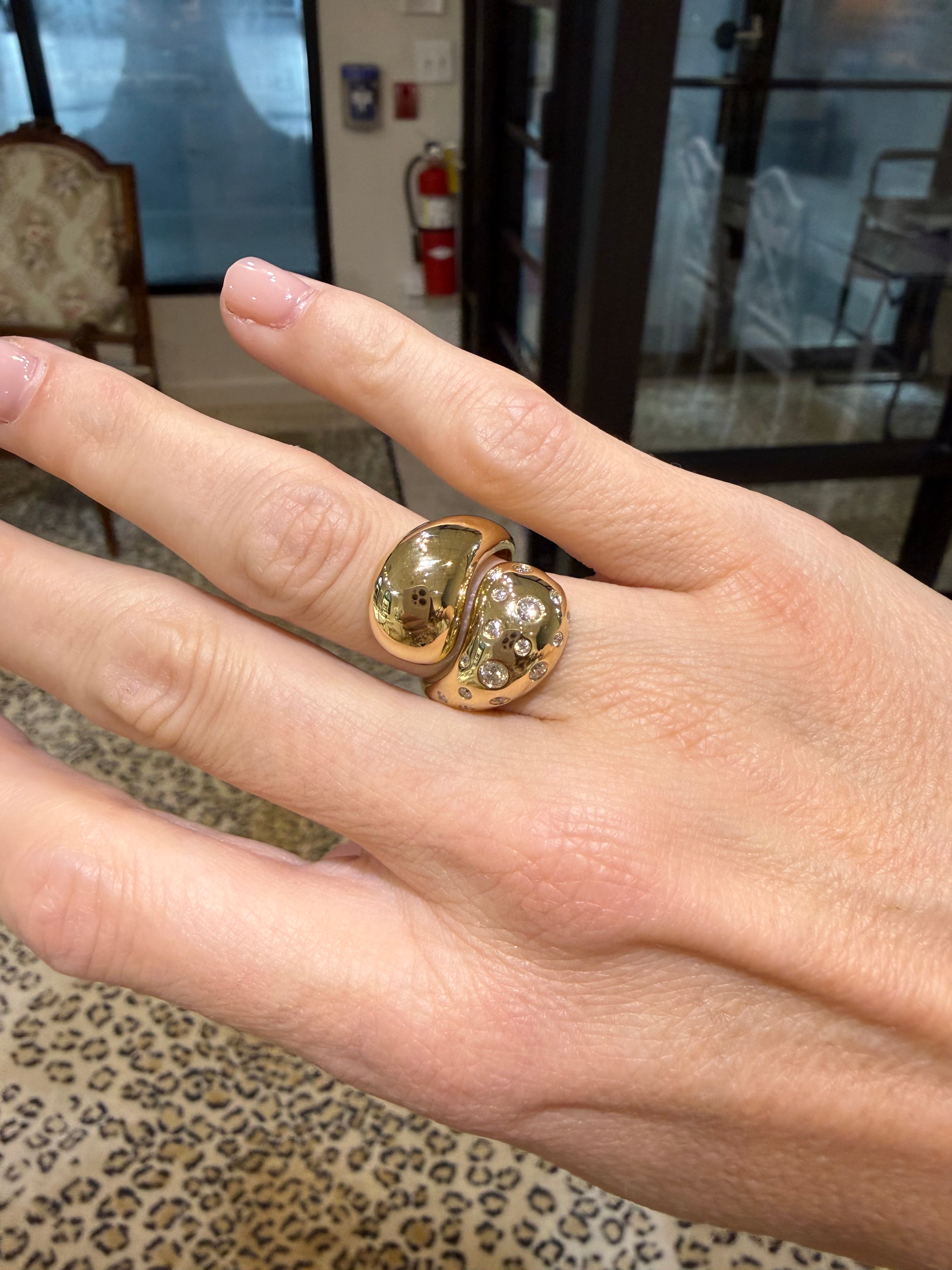 14k yellow gold scattered diamond ring on hand