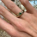 14k yg diamond and scatter ring on hand