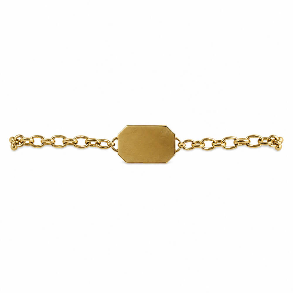 A 14K yellow gold chain bracelet with a flat, polished octagonal tag in the center, shown against a plain white background.