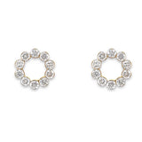 A pair of 18K yellow gold diamond stud earrings with open circle design 