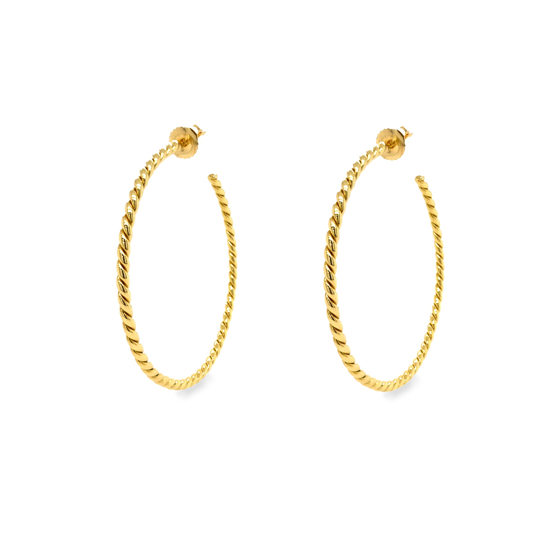 A pair of 18K yellow gold twist hoop earrings on a white background.