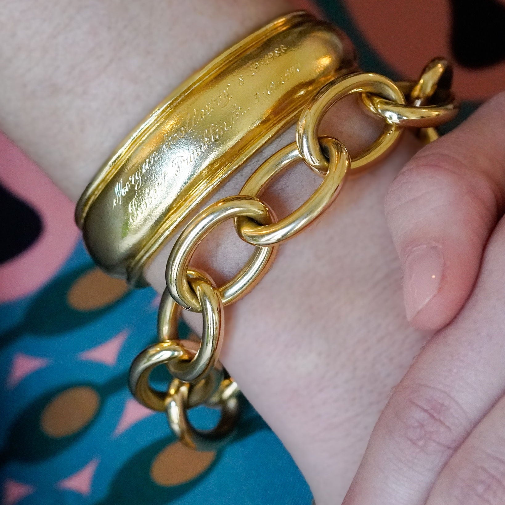 woman wearing 18K gold bracelets 