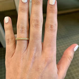 18k yellow gold diamond band ring on model