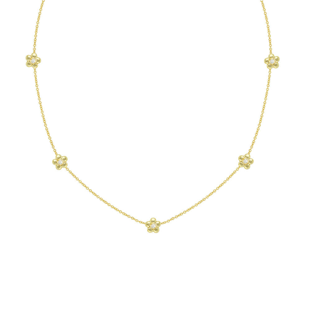 18K yellow gold necklace featuring daisy flower stations with single diamonds