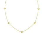 18K yellow gold necklace featuring daisy flower stations with single diamonds