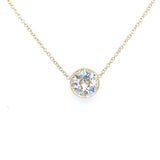 An 18kt yellow gold bezel set diamond pendant on a white background.
