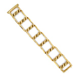 Yellow gold wide twist bangle on white background 