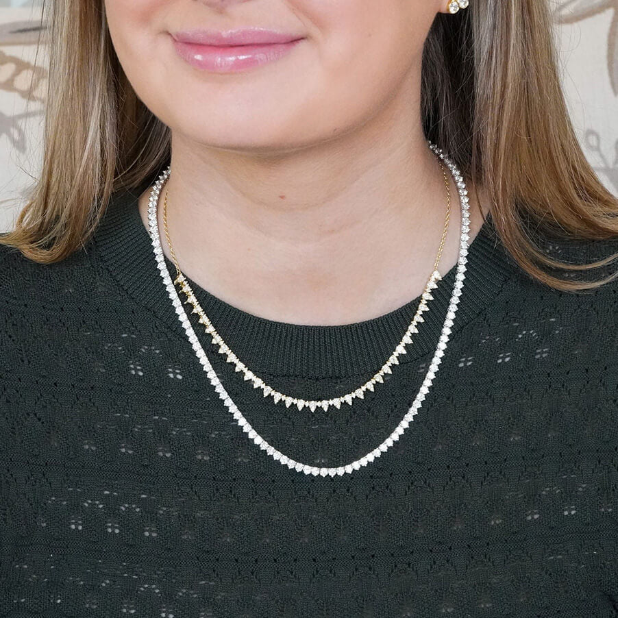 model wearing 18K gold diamond tennis necklaces