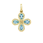 18K Gold pendant with four aquamarine gemstones on a white background