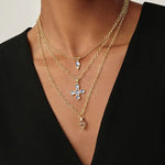 18K YG Moonstone Cross on necklace