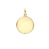 yellow gold round disc on white background