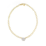 An 18kt yellow gold chain necklace with a solitaire diamond pin attached to the end.
