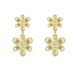 18K Gold flower-shaped drop earrings with a central diamond on a white background