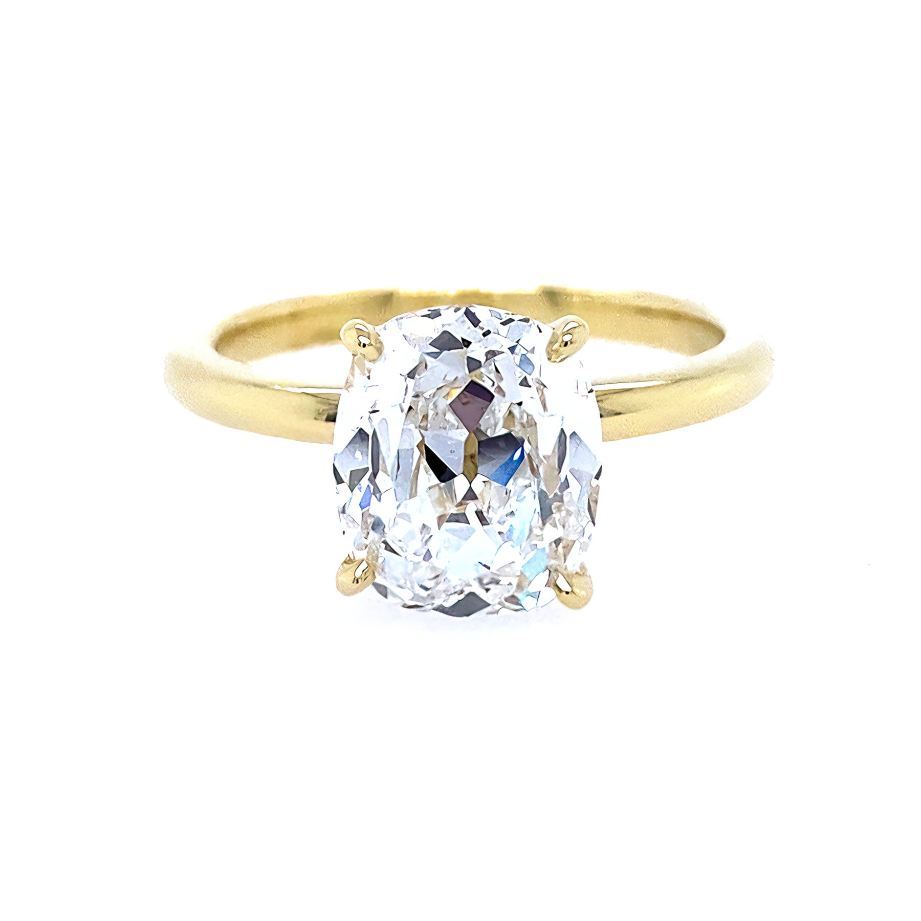 An 18kt yellow gold oval cut Old Mine diamond Solitaire ring 