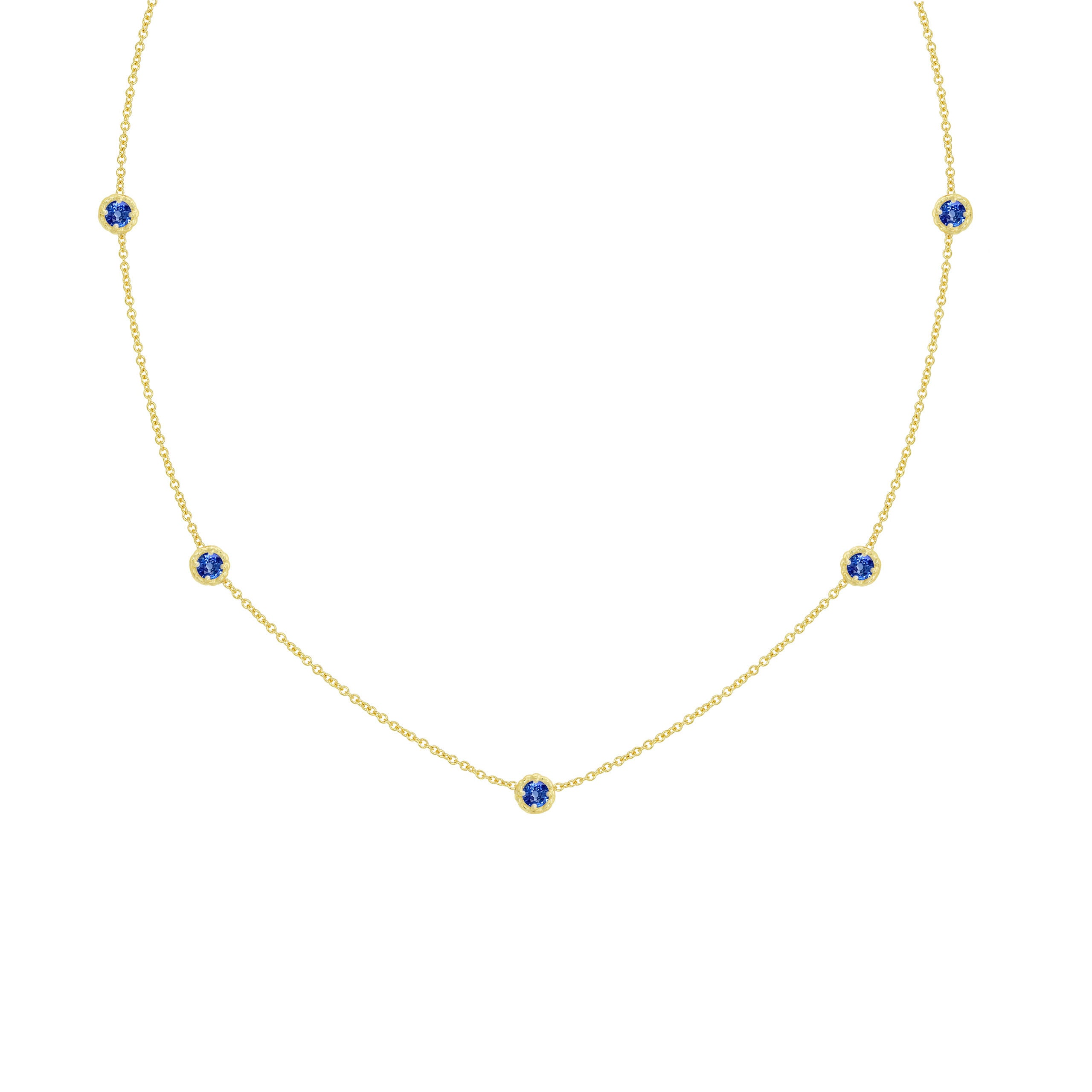 18K Gold necklace with blue sapphire gemstones on a white background