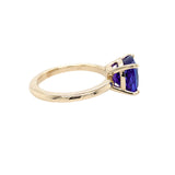 side view of 18K gold Tanzanite Solitaire Ring