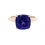 An 18kt yellow gold ring with a Tanzanite gemstone in the center