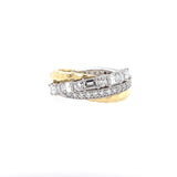 An 18kt yellow gold and platinum band ring with multiple diamonds set in it.