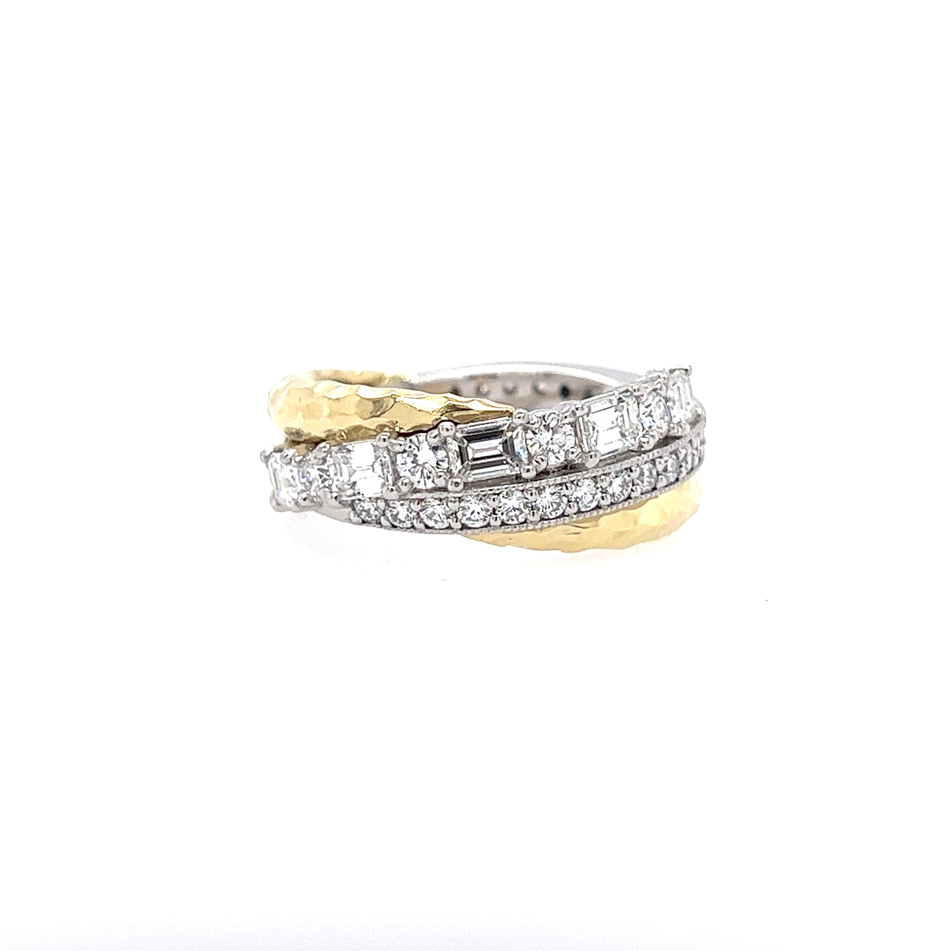 An 18kt yellow gold and platinum band ring with multiple diamonds set in it.