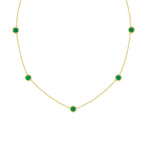 18K Gold necklace with green emerald gemstones on a white background