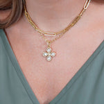 woman wearing 18K gold necklaces designed by Laura Pearce