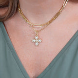 woman wearing 18K gold necklaces designed by Laura Pearce