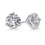 A pair of 18K white gold martini set diamond stud earrings.