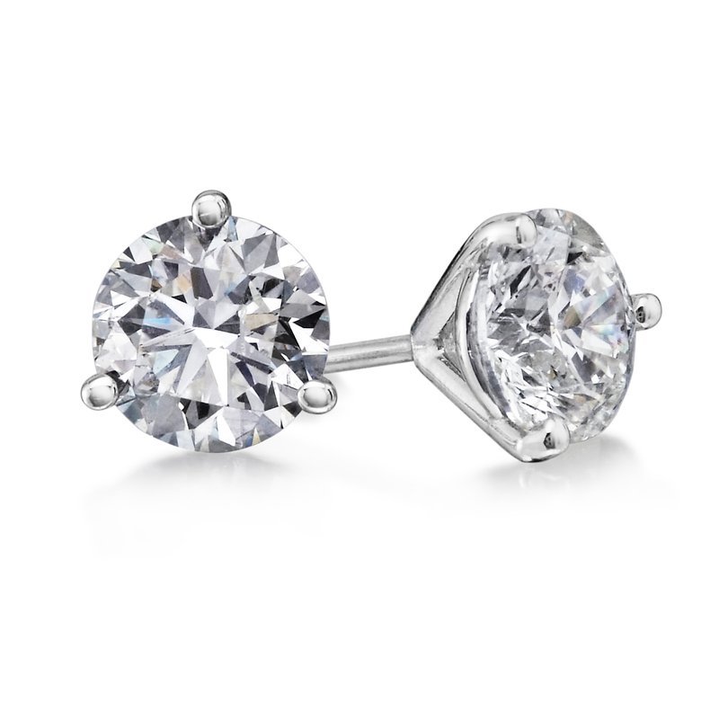 A pair of 18K white gold martini set diamond stud earrings.