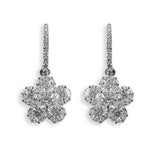 A pair of 18K white gold mosaic diamond flower drop earrings.