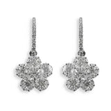 A pair of 18K white gold mosaic diamond flower drop earrings.