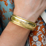 18K yellow gold Laura cuff bracelet designed by Laura Pearce