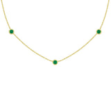 18K yellow Gold necklace with emerald green gemstones on a white background