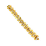 18K Gold and Diamond Estate Bracelet laid out flat