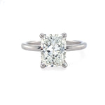 An 18K white gold radiant cut diamond ring with a G-H SI2 GIA certification, displayed on a white background.