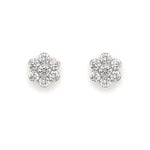 A pair of 18K white gold diamond flower earrings.