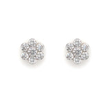 A pair of 18K white gold diamond flower earrings.