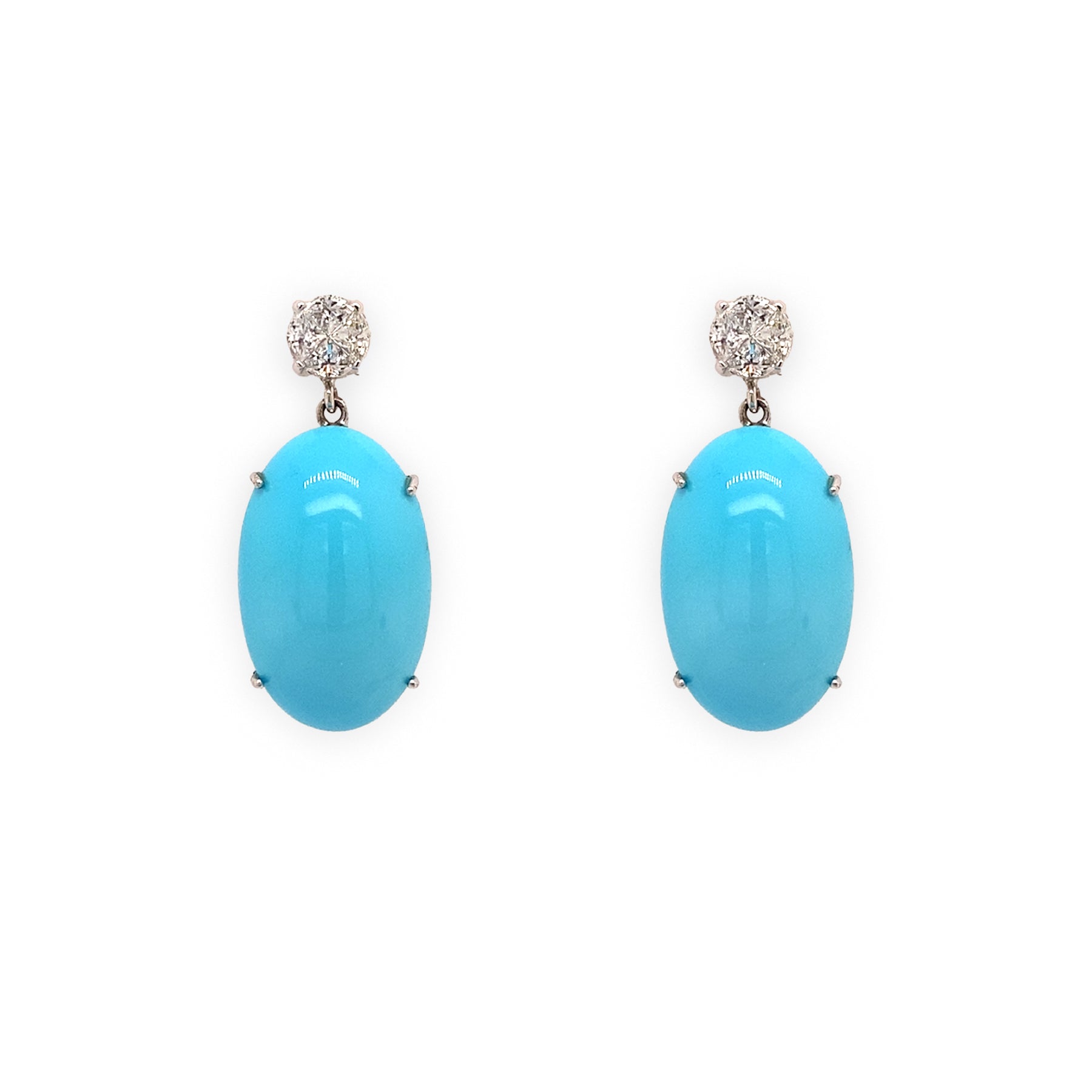 A pair of 18K white gold turquoise drop earrings with diamonds.