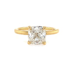 An 18K yellow gold cushion cut diamond ring with a clear, certified diamond in a gold band.