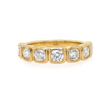 7 stone round bezel diamond band