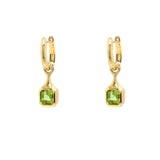 18K Gold drop earrings with green Peridot gemstones on a white background
