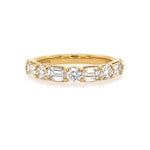 18K Gold ring with diamonds on a white background