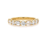 18K Gold ring with diamonds on a white background